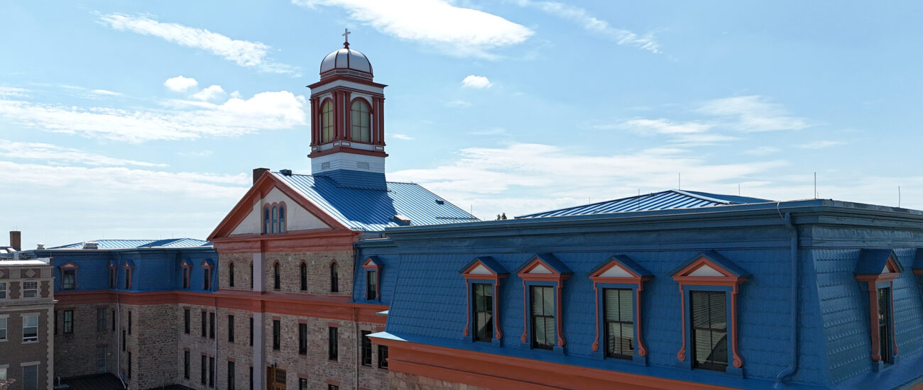 Regis University Main Hall Classic Shingle Bristol Blue